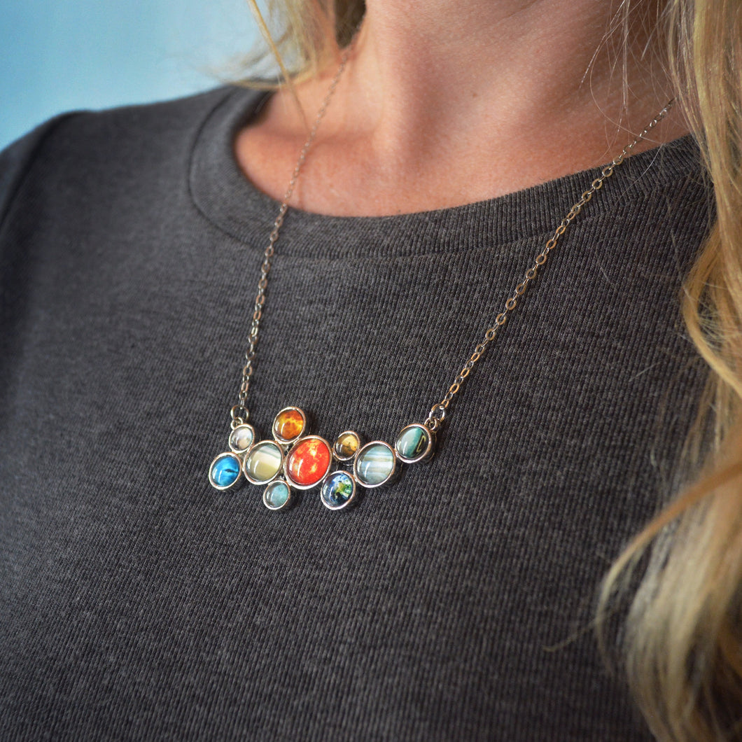 Solar System Bubble Bib Necklace | space jewelry, planets | Uncommon Goods